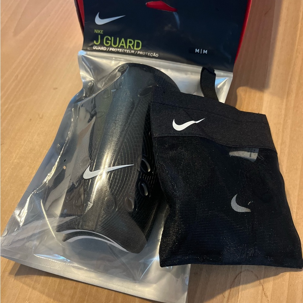 Nike soccer shin guards and sleeves - child